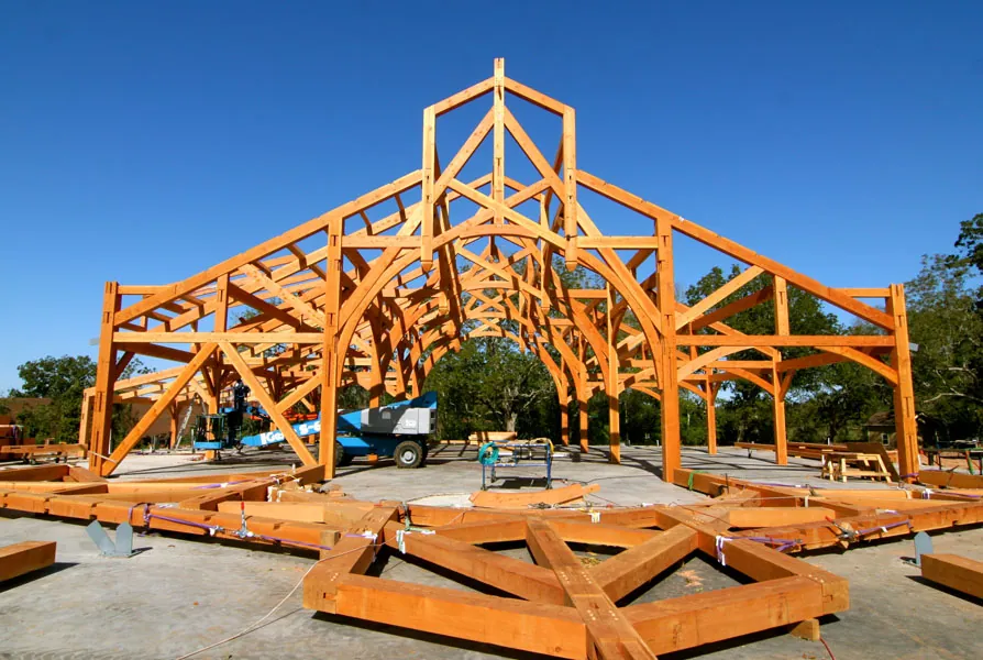 Timber frame car barn enclosed with structural insulated panels